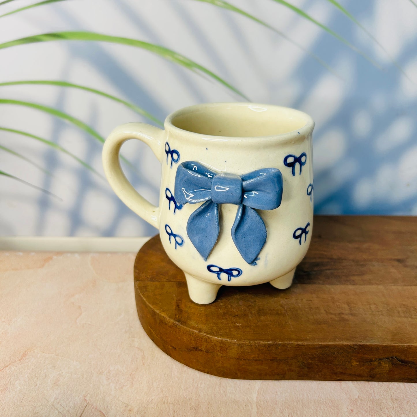 Blue Bow Leg Mug