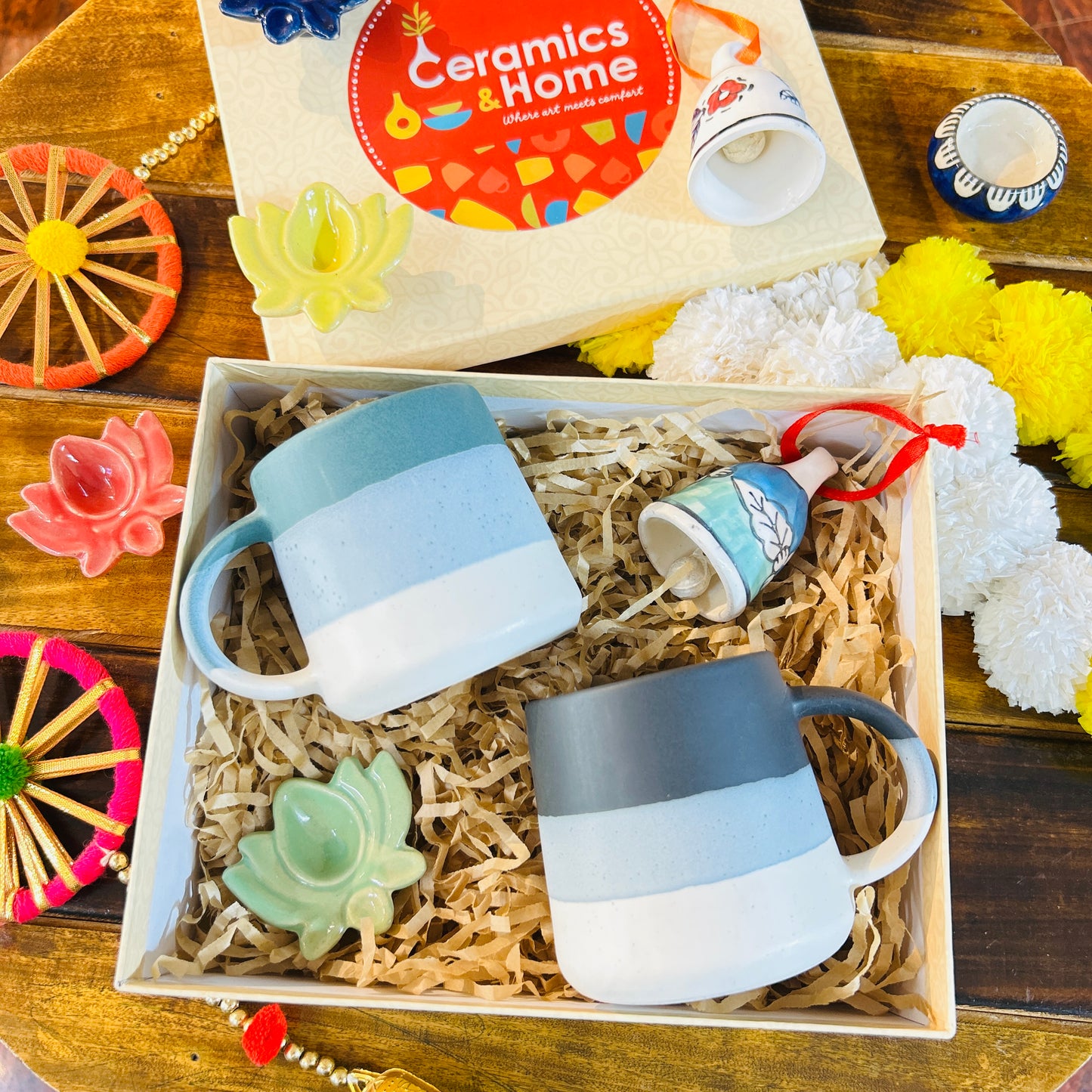 Festive Ceramic Mug Gift Hamper – 2 Mugs with Lotus Diya & Bell