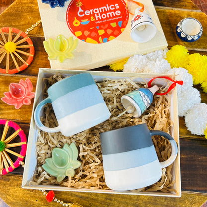 Festive Ceramic Mug Gift Hamper – 2 Mugs with Lotus Diya & Bell
