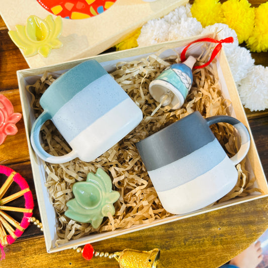 Festive Ceramic Mug Gift Hamper – 2 Mugs with Lotus Diya & Bell